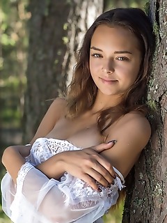 Slava top model slava bares her gorgeous body as she strips in the woods.